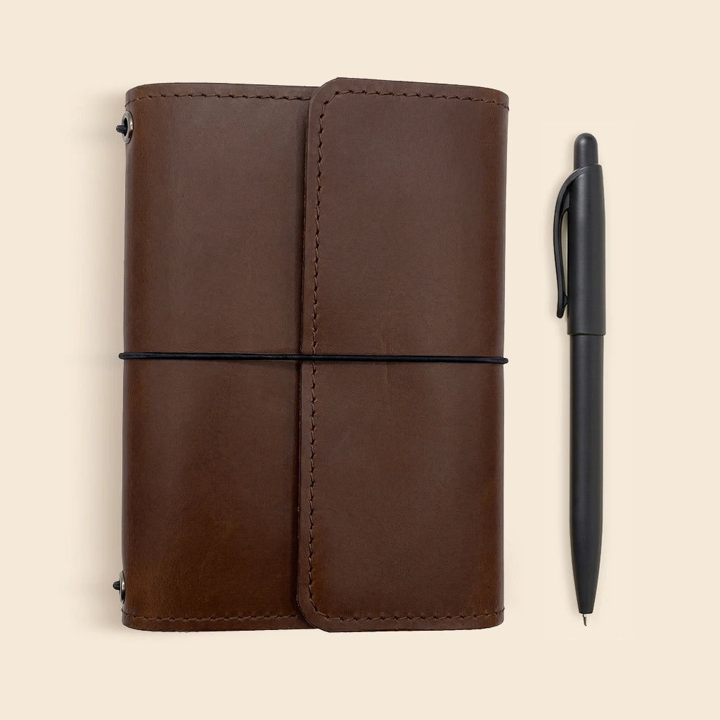 Stylish leather journal organizer with spacious pockets for cards and small essentials.