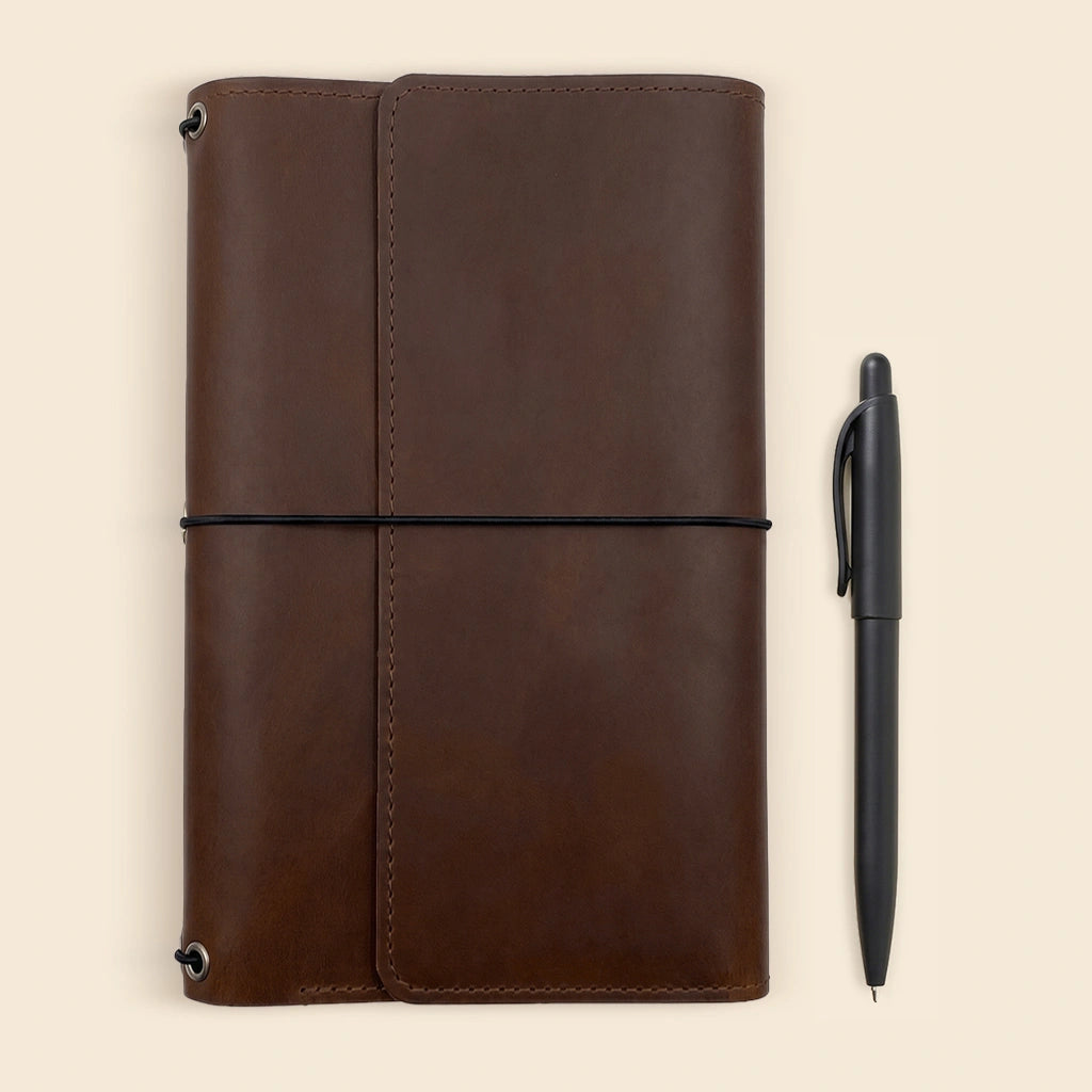 Premium leather journal organizer designed with functional pockets for everyday essentials.