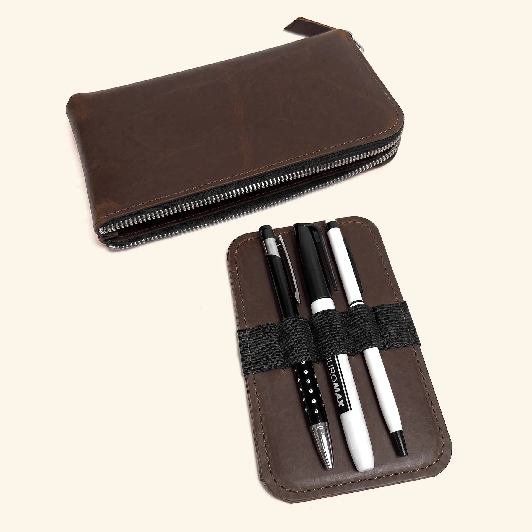 Leather office essentials pouch with secure zipper and timeless handcrafted character.