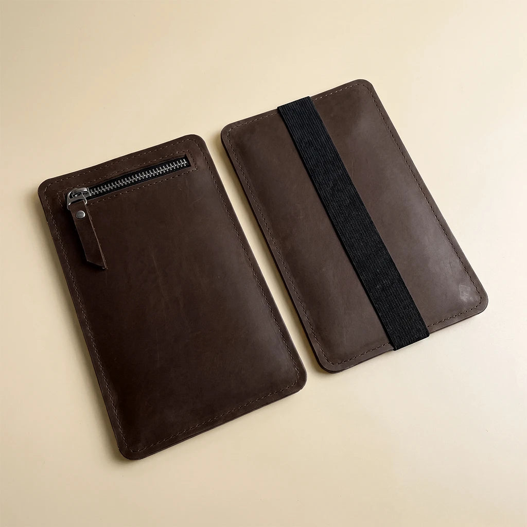 Minimal leather notebook pouch with elastic band attachment system