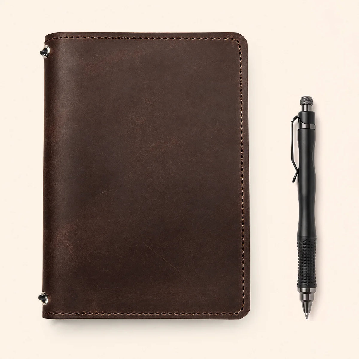 Crazy Horse leather journal sleeve with twin elastic closures and convenient organizational pockets