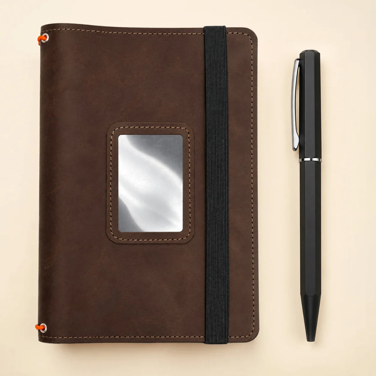 Handmade genuine leather journal cover with three bands and spacious interior pockets.