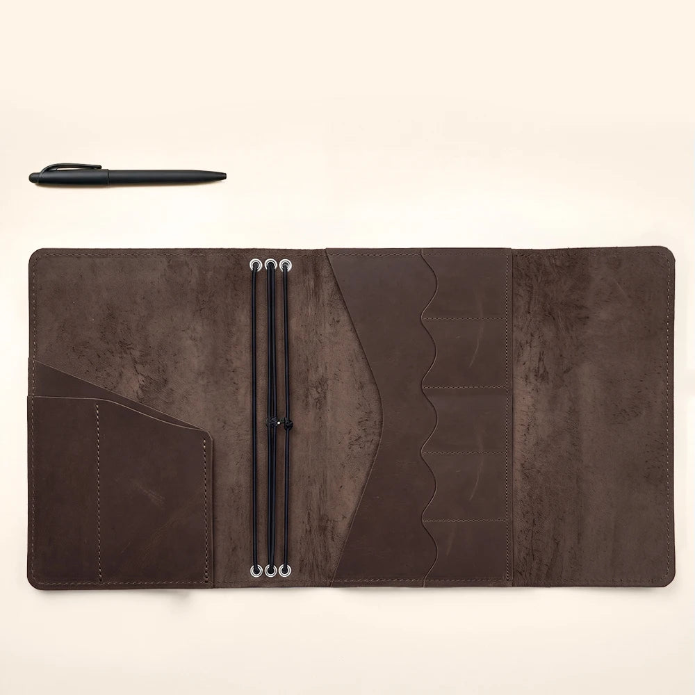 Genuine leather refillable notebook case featuring practical design and premium handcrafted details.