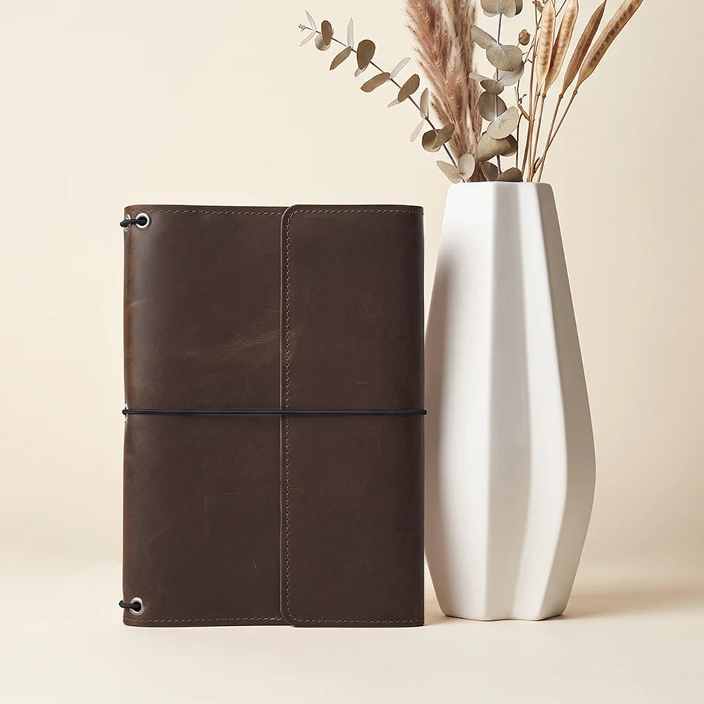 Premium leather writing journal cover made for planners, notebooks, and daily organization.