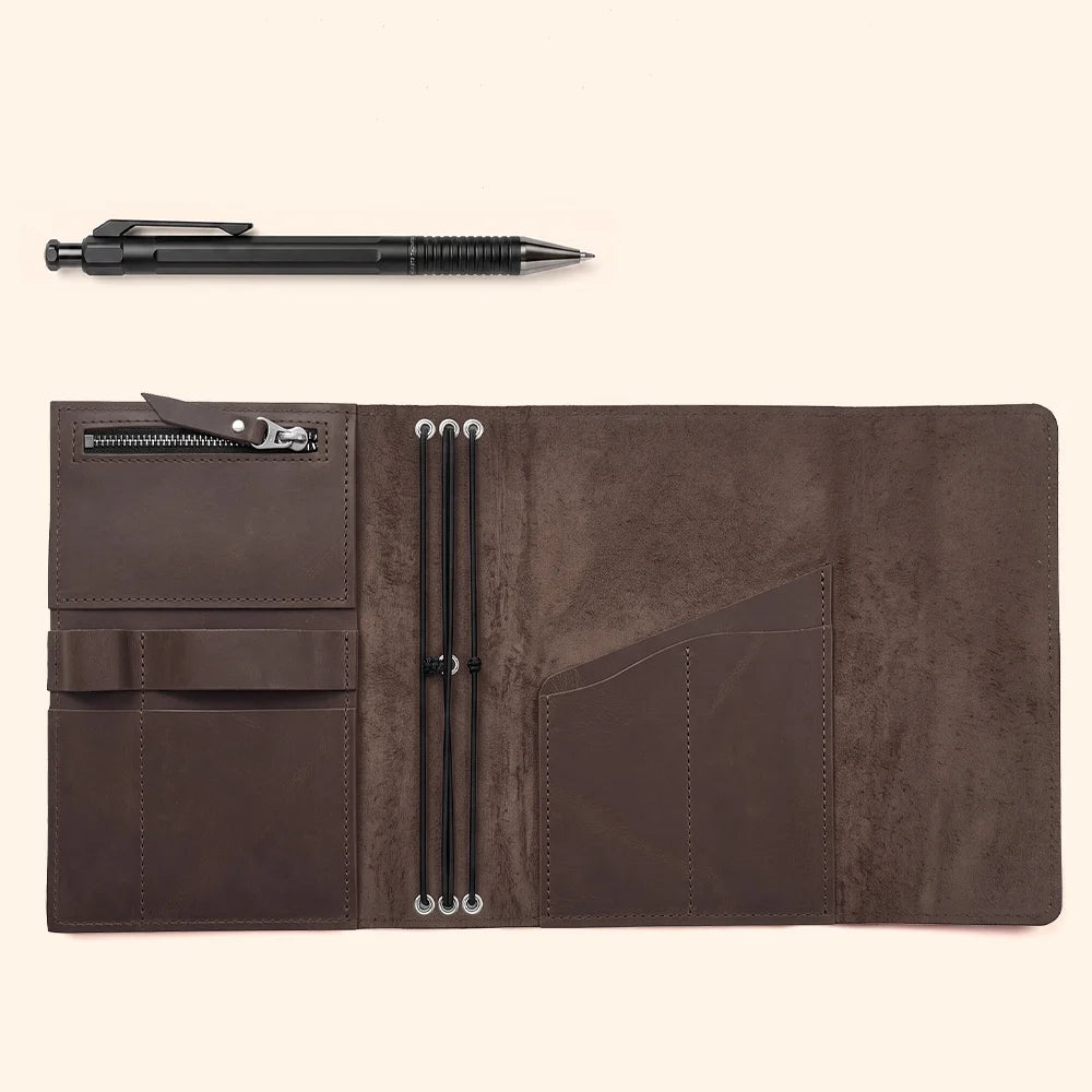 Genuine leather journal cover designed with interior pockets and a convenient pen holder
