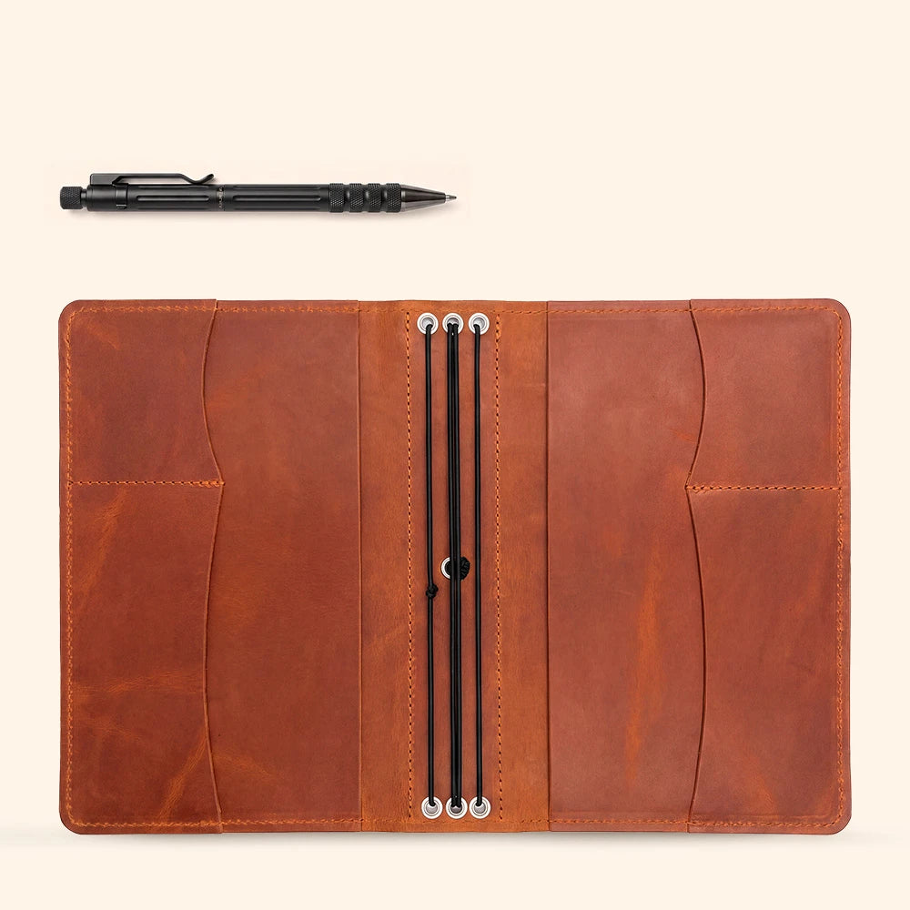 Refillable journal cover featuring premium leather construction, storage pockets, and pen holder inside.
