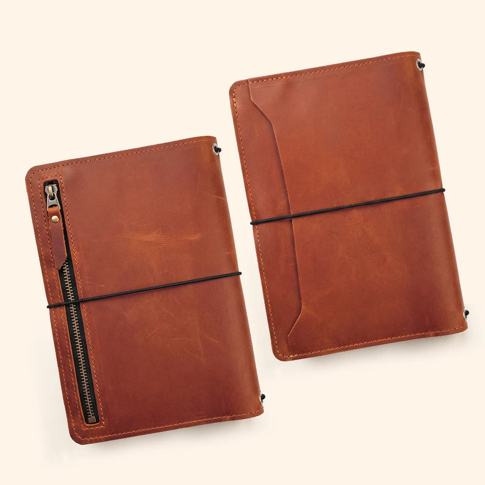 Handmade leather journal cover featuring inner card pockets and integrated pen loop design.