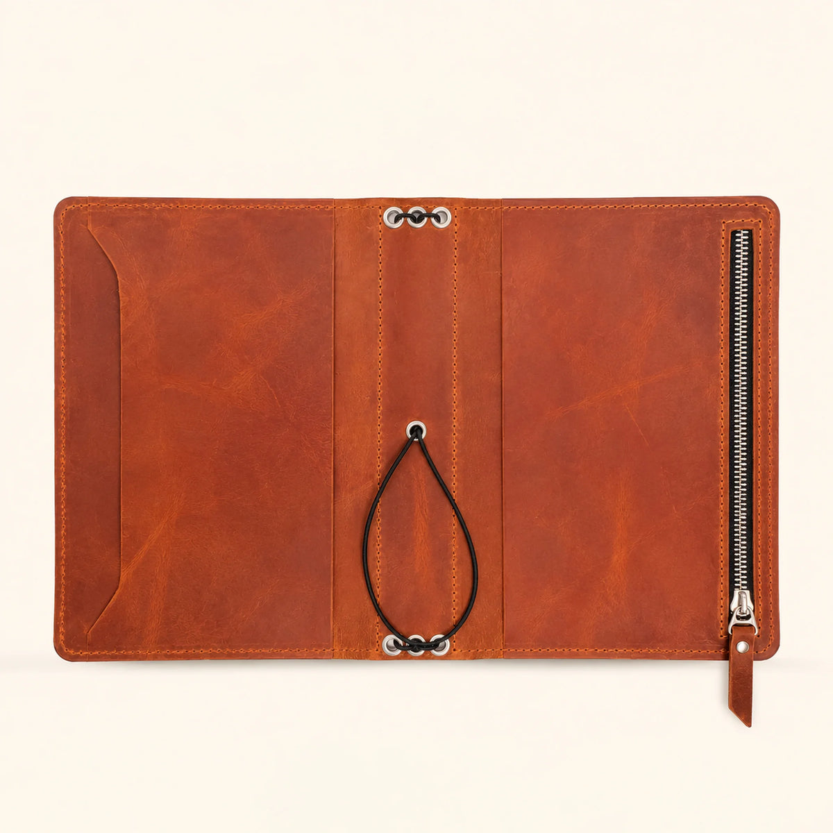 Natural leather notebook cover with spacious interior pockets and exterior storage compartments