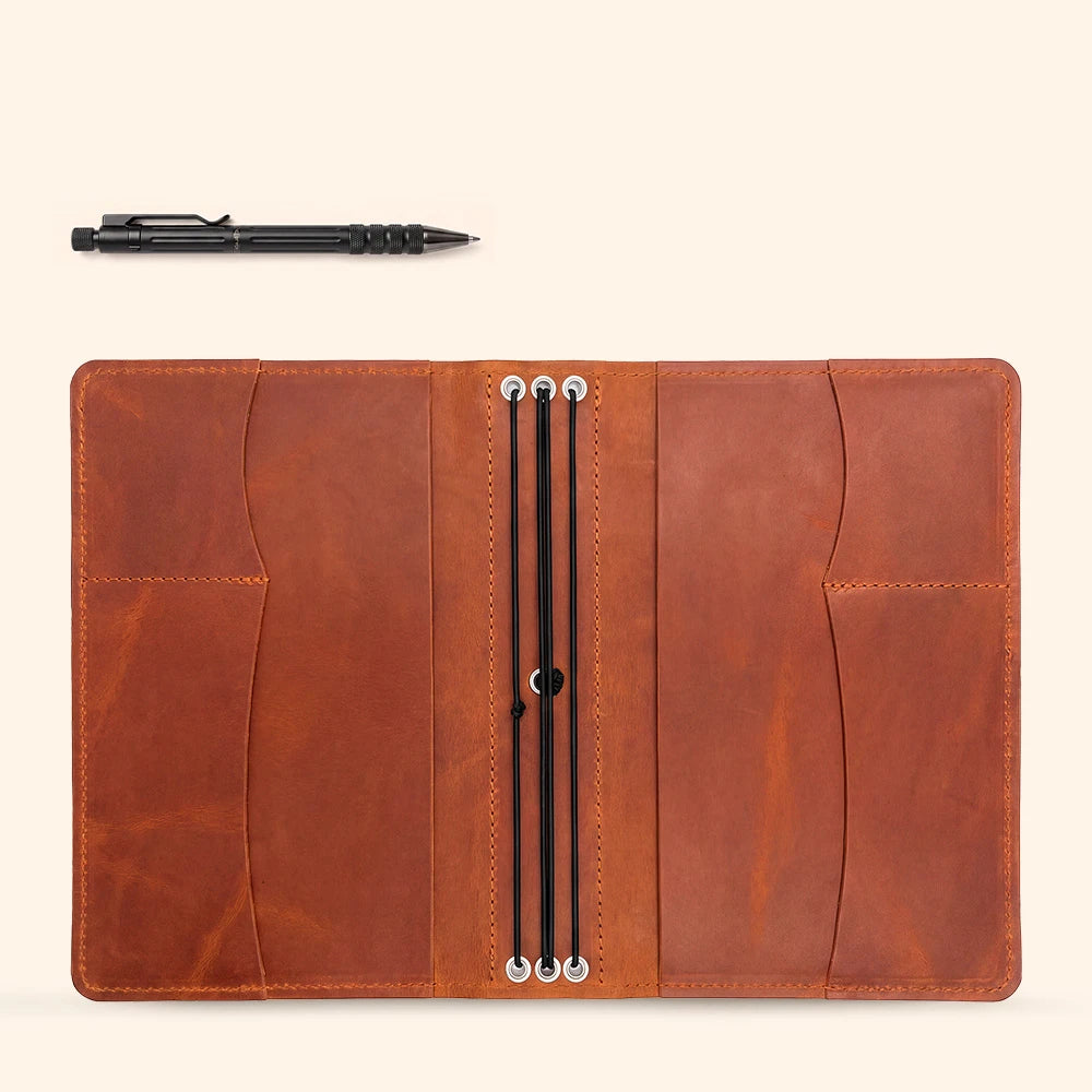 Leather notebook jacket featuring durable craftsmanship and organized storage compartments.