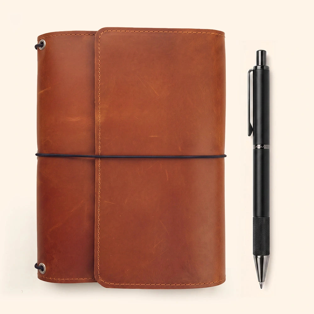 Premium leather diary organizer featuring practical interior layout and secure pen keeper.