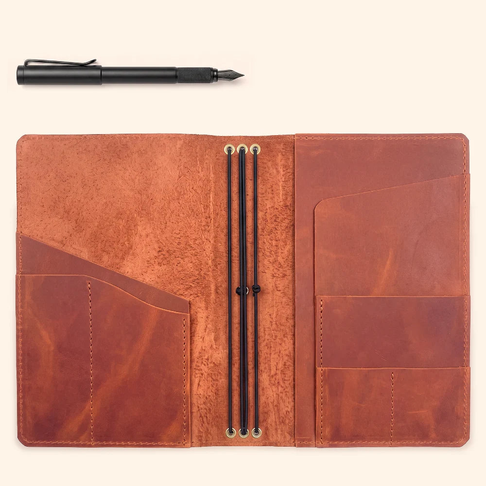 Flexible leather journal holder built for three interchangeable paper inserts.