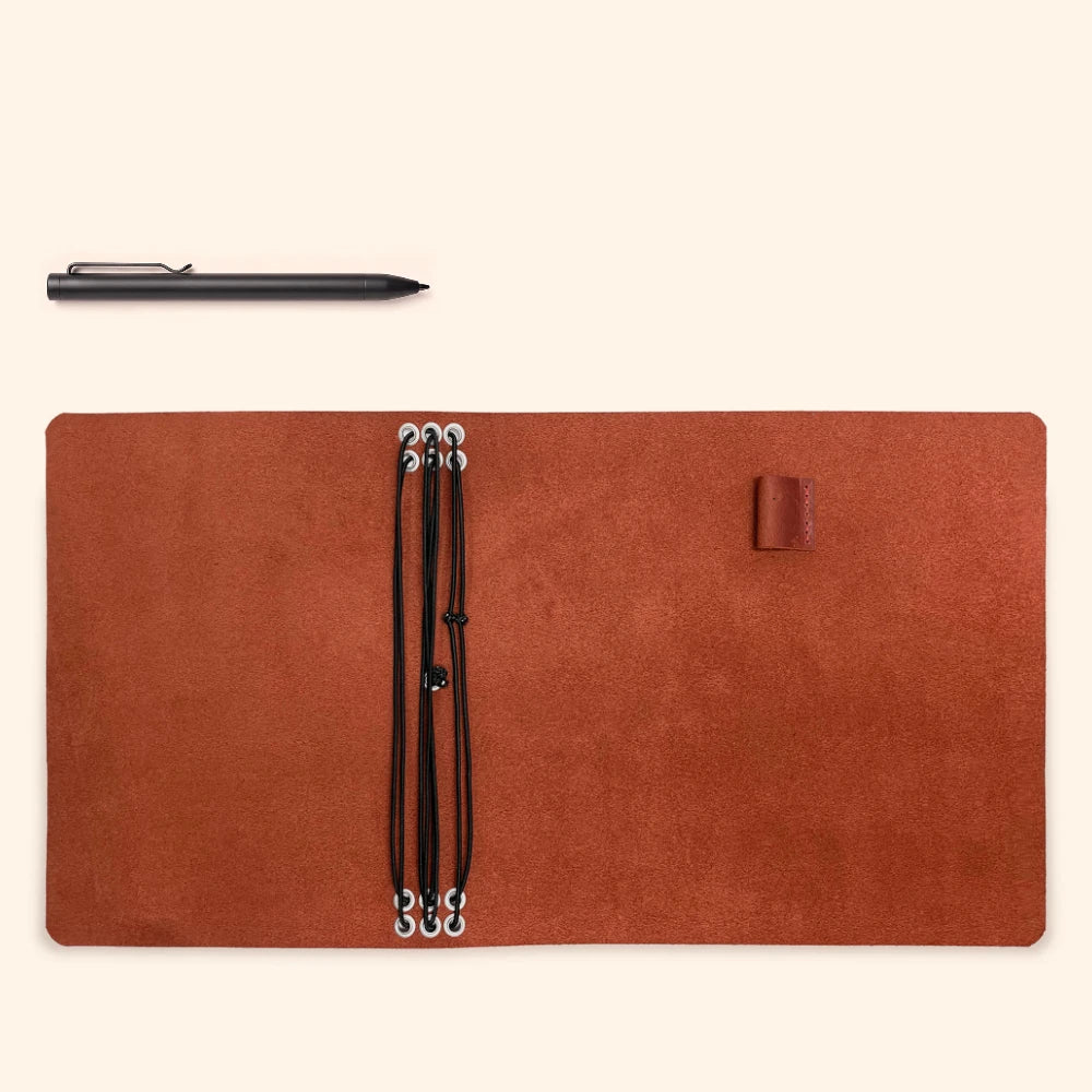 Full grain leather notebook cover featuring six elastic cords and a built-in pen loop.