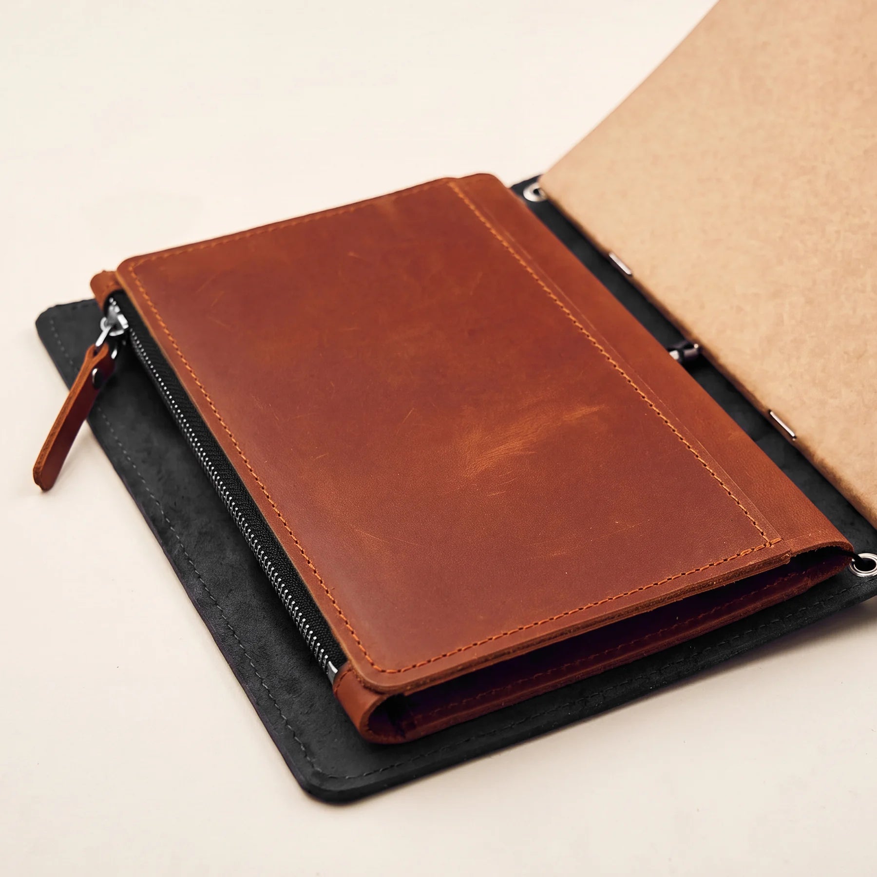 Genuine leather planner insert with card pockets for elastic notebook covers.