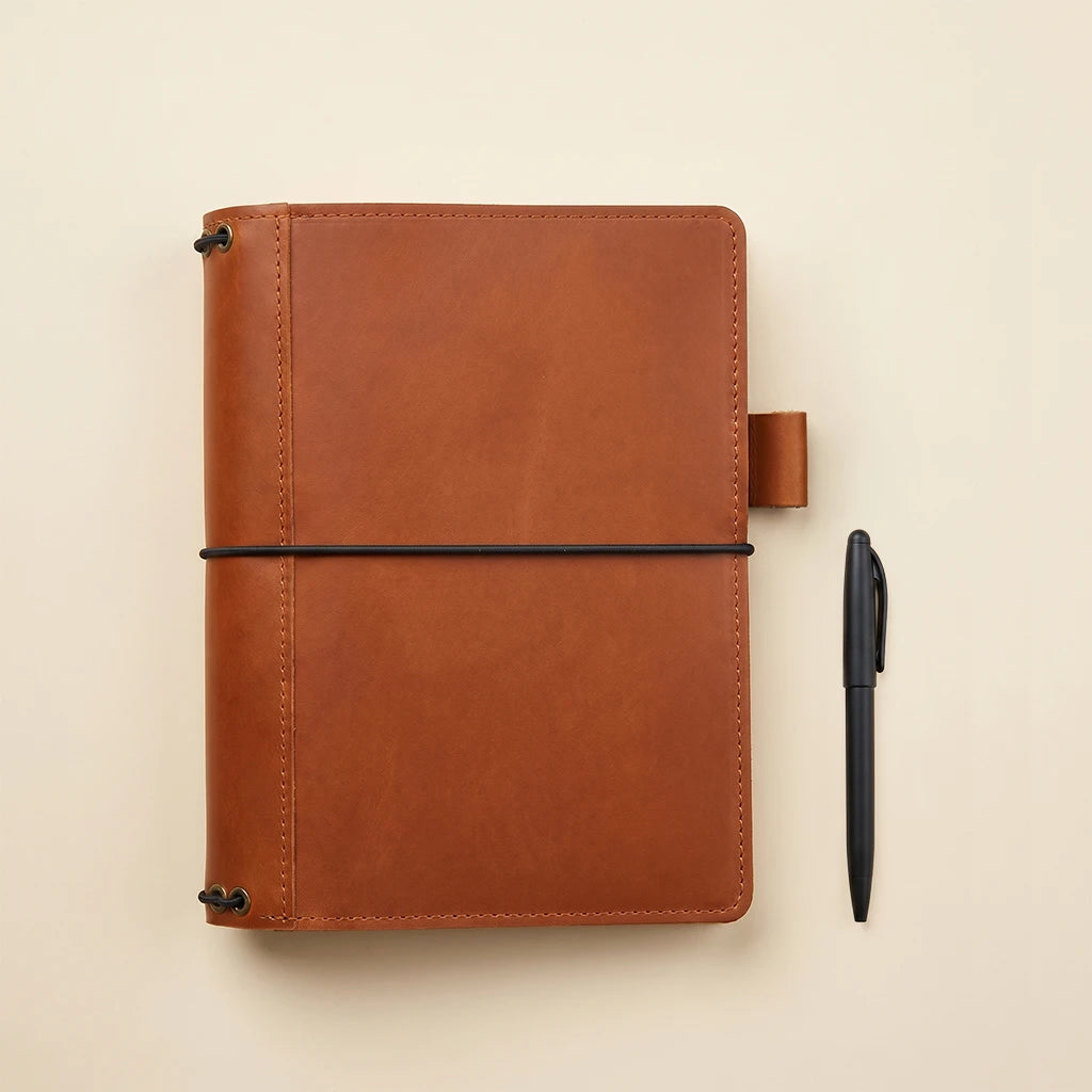 Leather notebook sleeve with functional storage and flexible elastic system