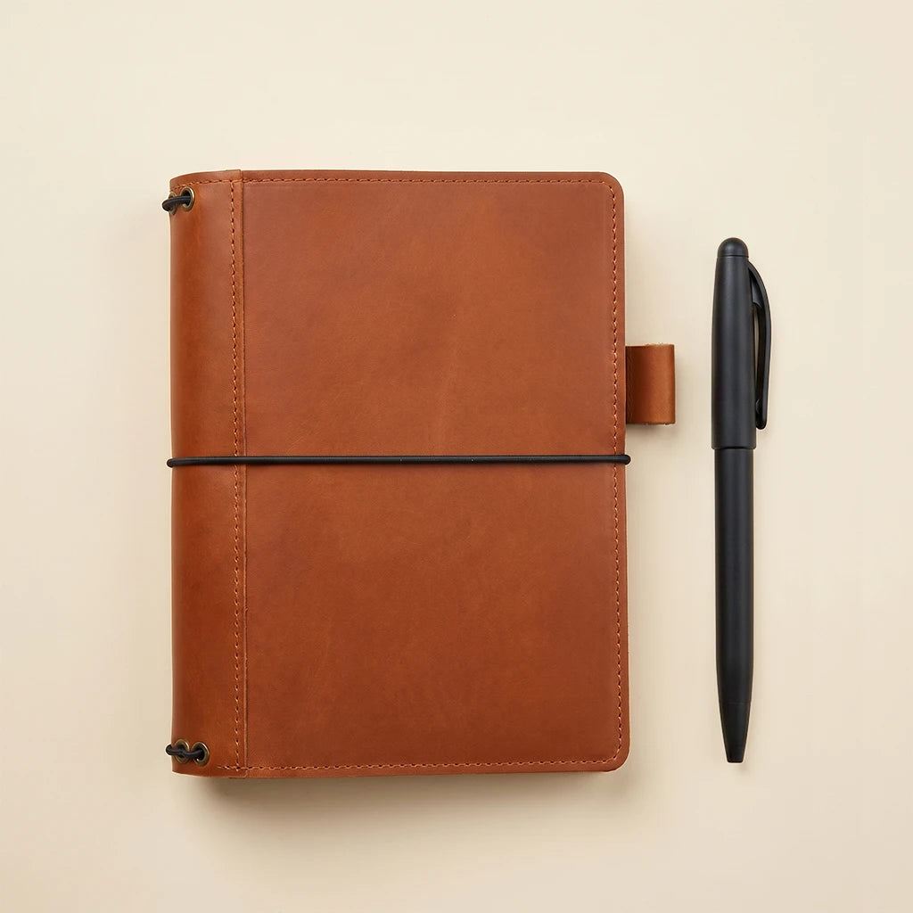 Leather notebook cover for refillable journals with pen holder included