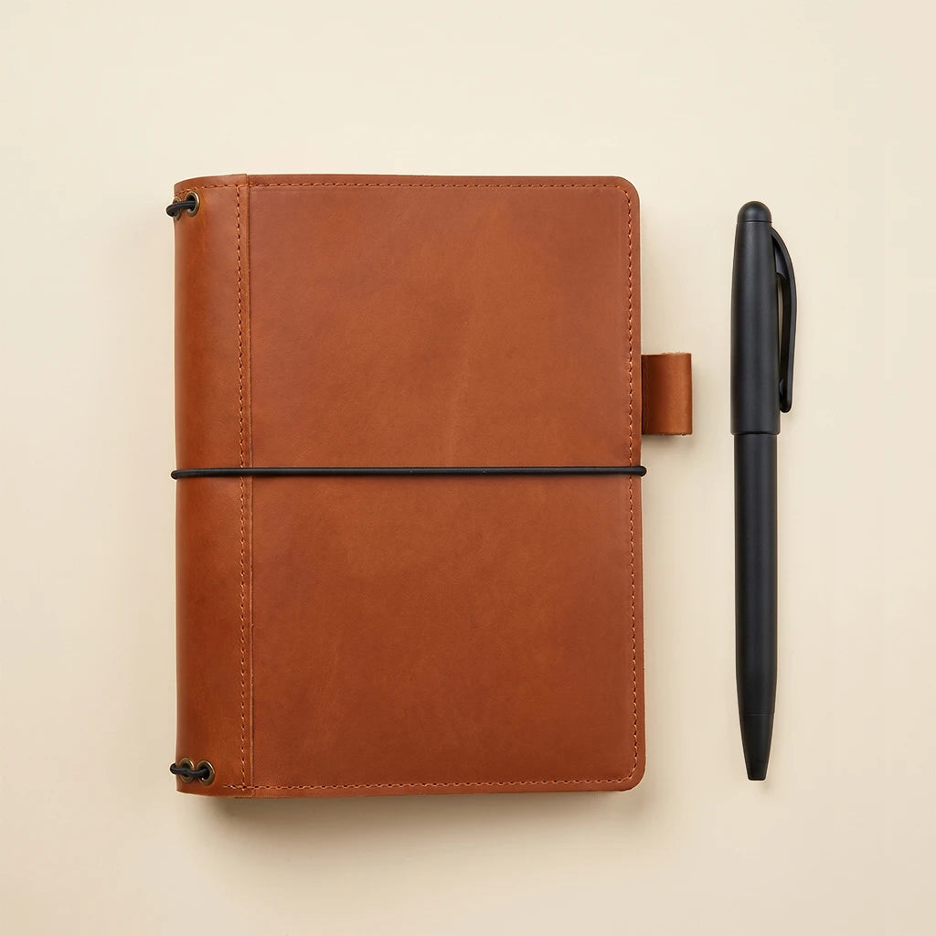 Genuine leather journal cover with pen holder and five elastic notebook straps