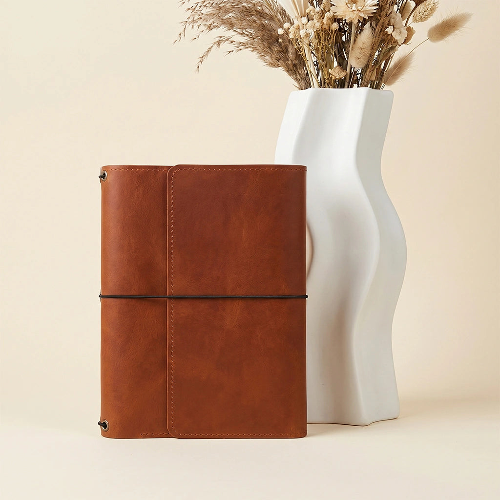 Premium notebook cover made from natural leather with flexible elastic notebook holders.