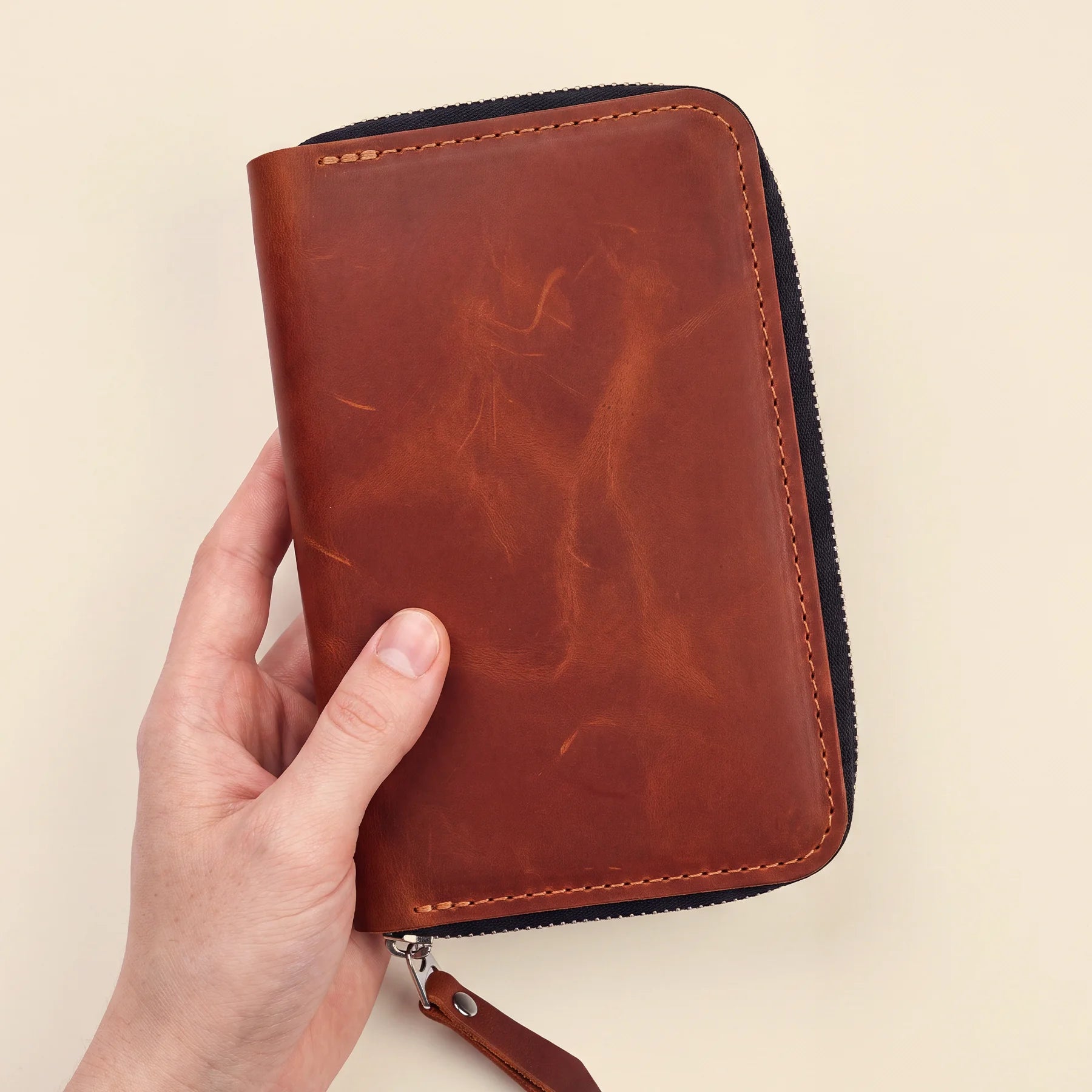 Minimal leather pencil case with zipper made from full-grain genuine leather.