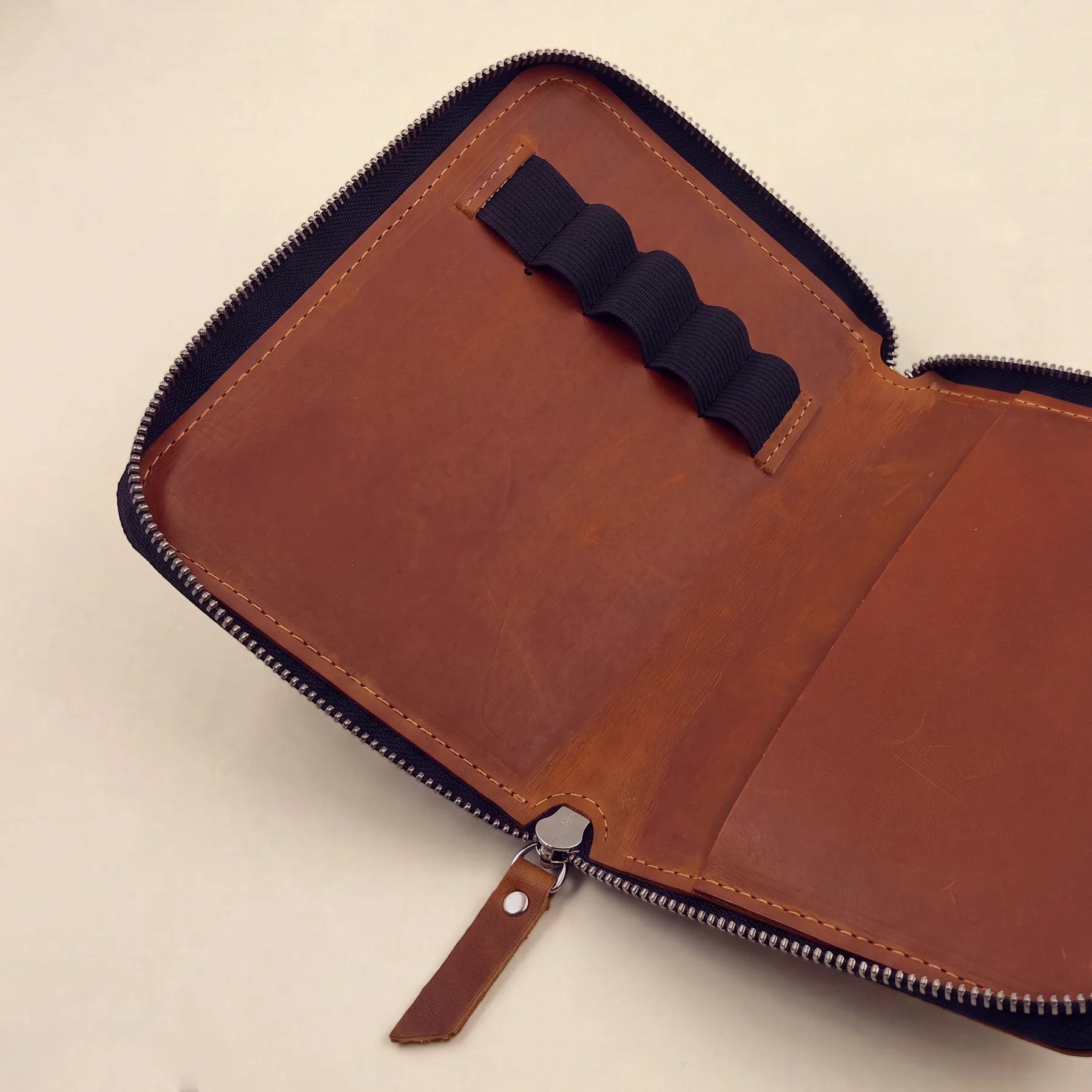 Everyday leather pen sleeve with zipper made from premium natural full-grain leather.