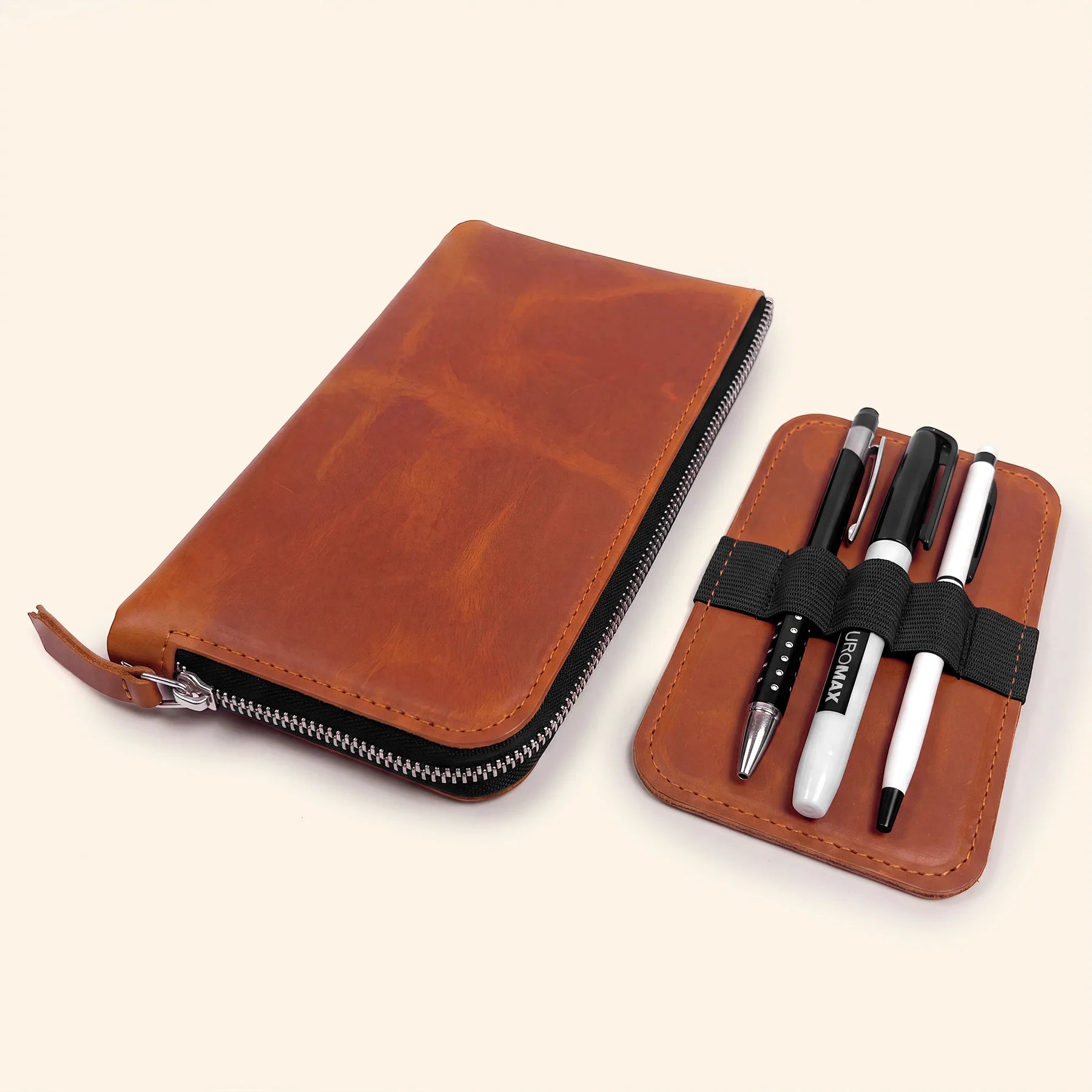 Premium leather writing organizer with secure zip and compact travel-ready design.