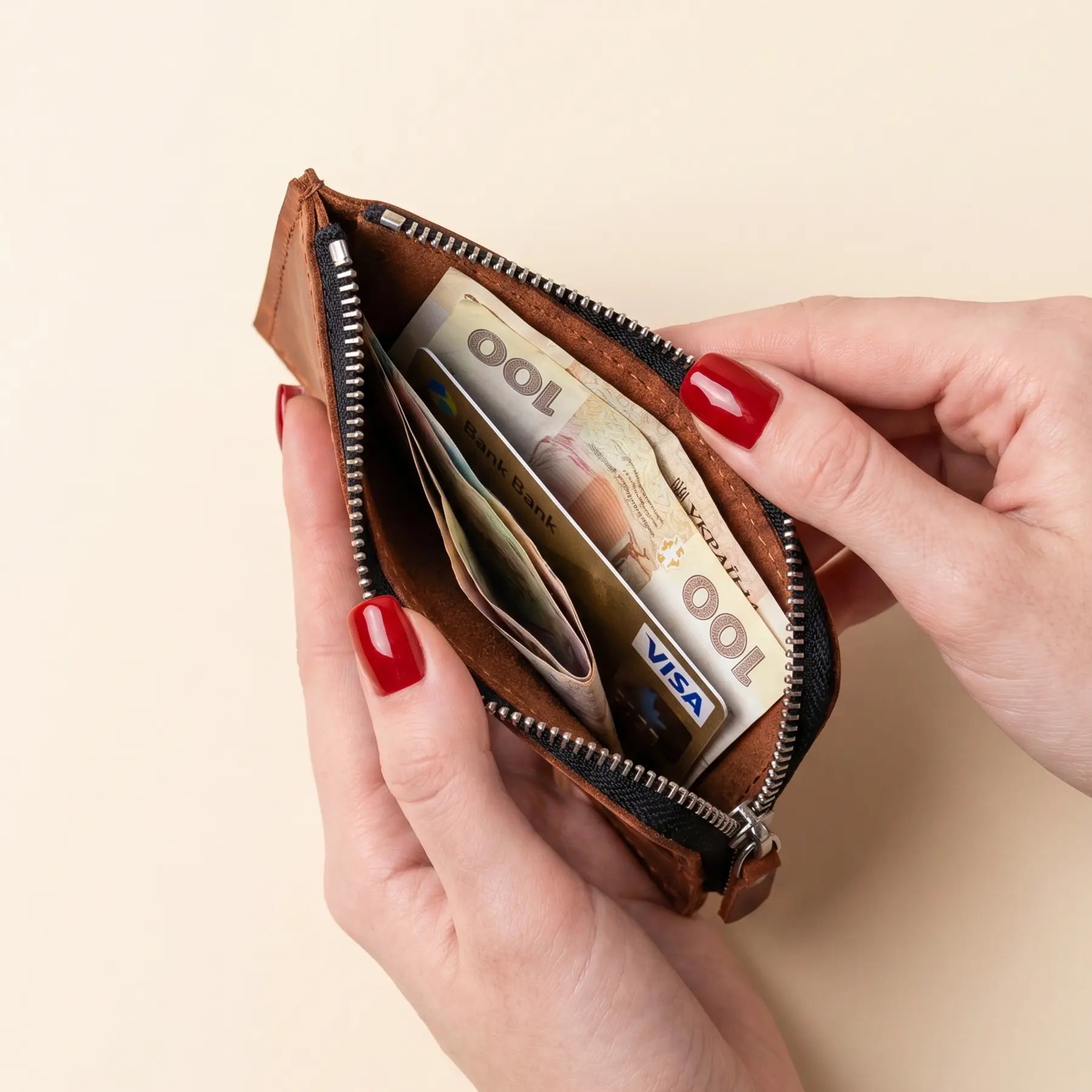 Genuine leather small wallet with zipper compartment for cards, cash, and loose change.