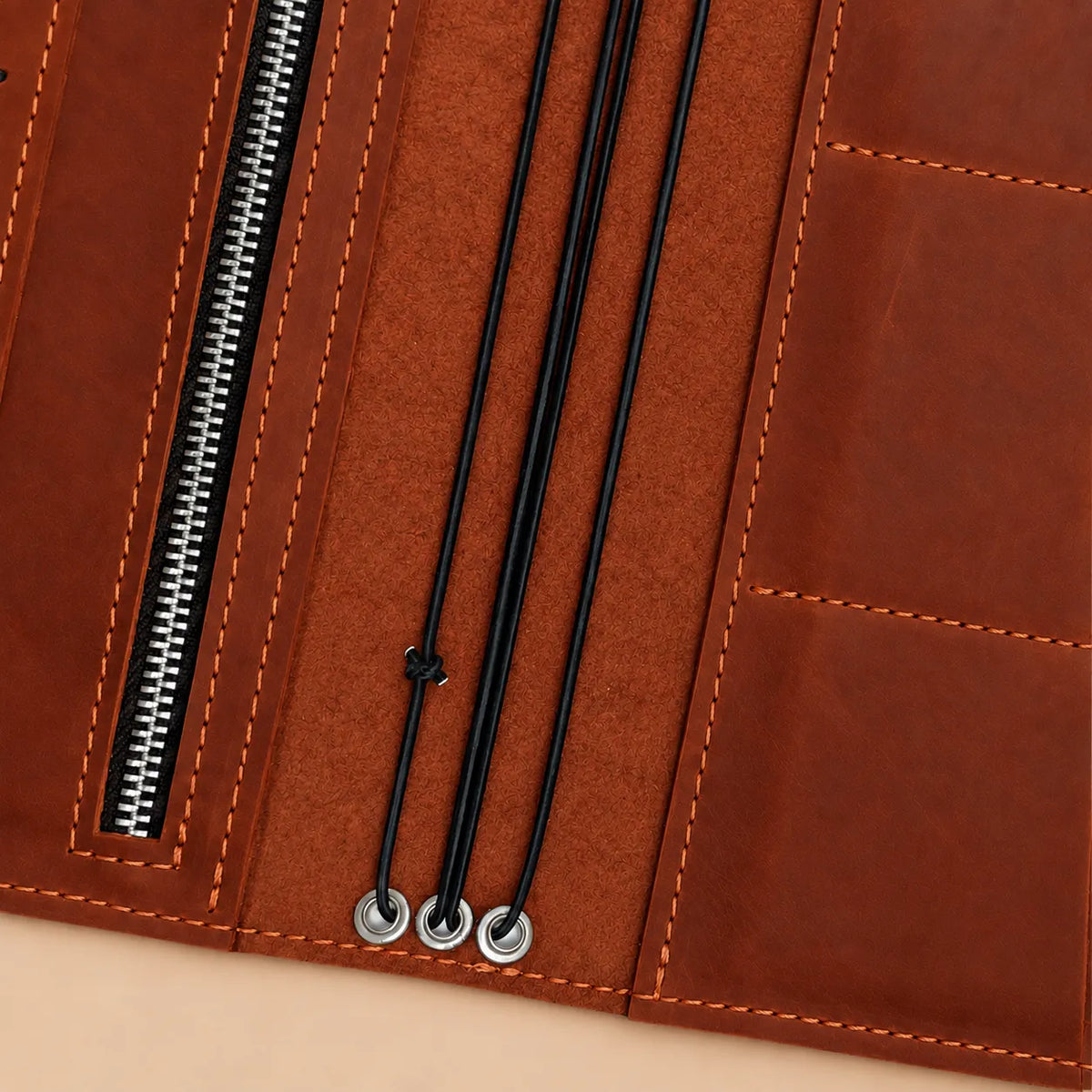 Leather notebook cover made from Crazy Horse leather with pockets and wrist strap