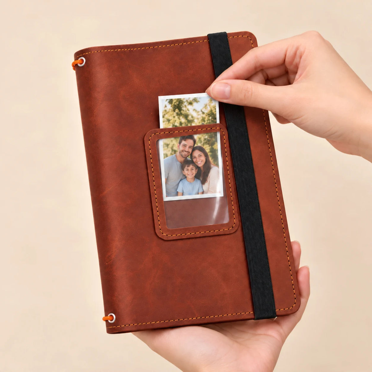 Genuine leather journal with three elastic loops, functional inner pockets, and an exterior transparent image holder.