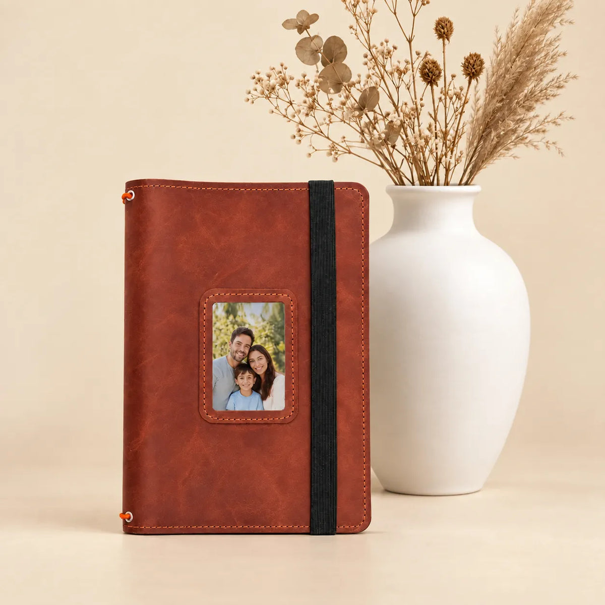 Handmade genuine leather journal holder featuring two elastic straps and functional storage pockets.