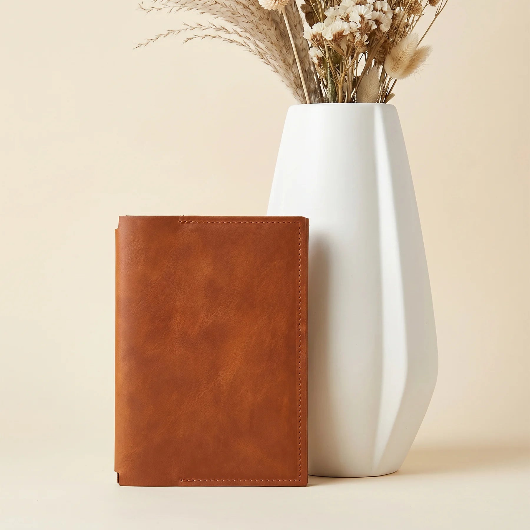 Minimalist leather notebook insert with multiple storage pockets