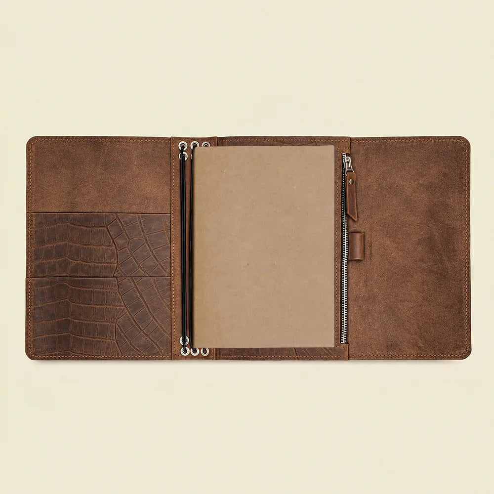 Leather notebook organizer with six elastic bands, practical pockets, and a convenient pen loop.