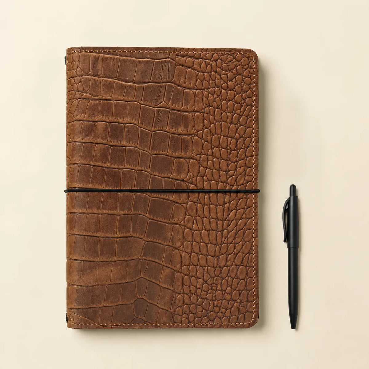 Handmade Crazy Horse leather notebook with practical pockets for organizing belongings.