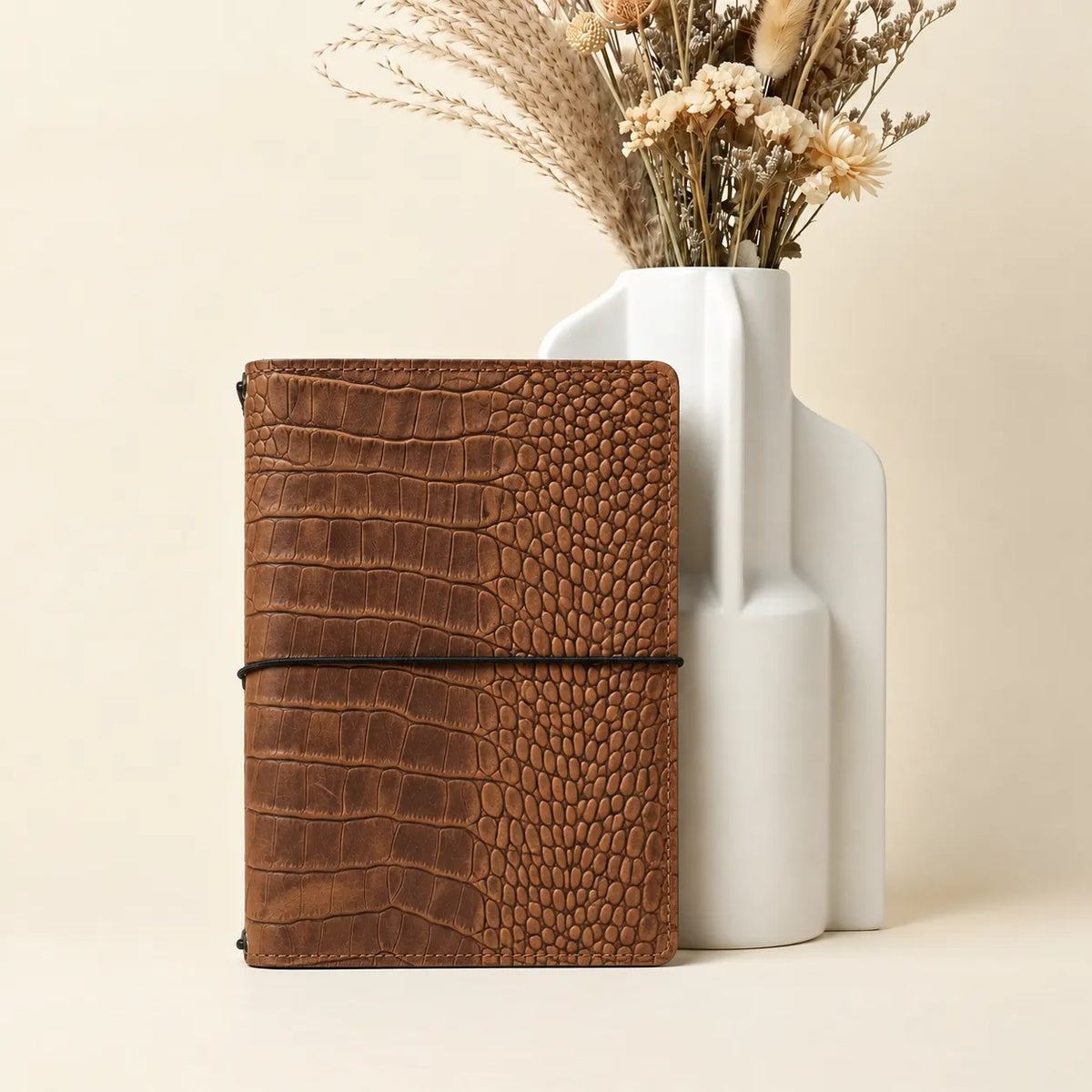 Genuine Crazy Horse leather notebook with interior pockets for convenient everyday organization.