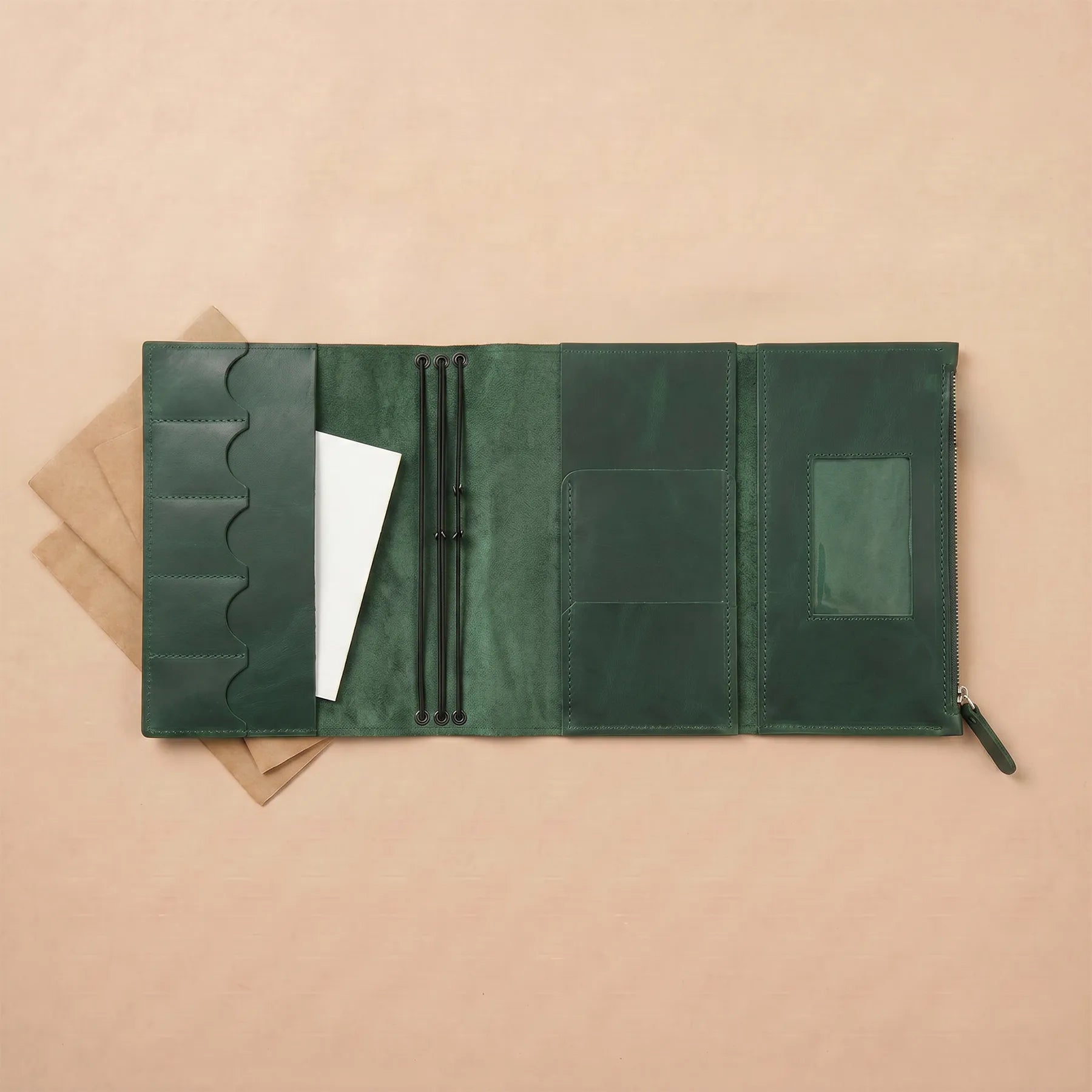 Refillable leather notebook cover made from premium handcrafted genuine leather materials.