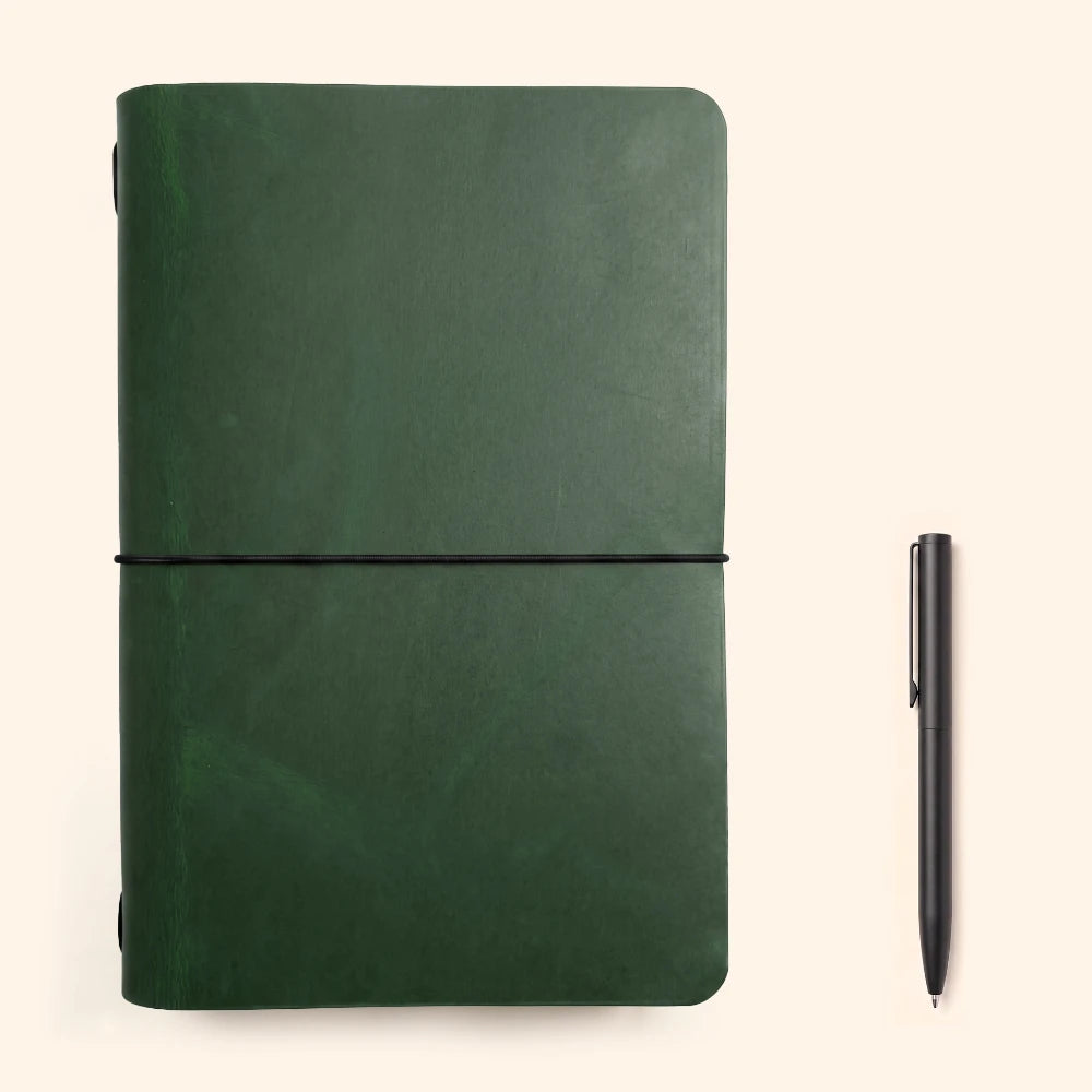Leather writing cover with flexible elastic support and a straightforward journal insert.