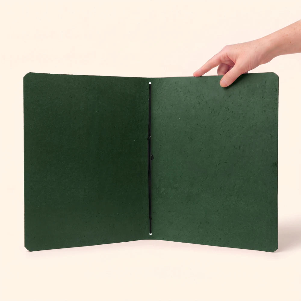 Natural leather sleeve offering a refined and durable home for journaling essentials.