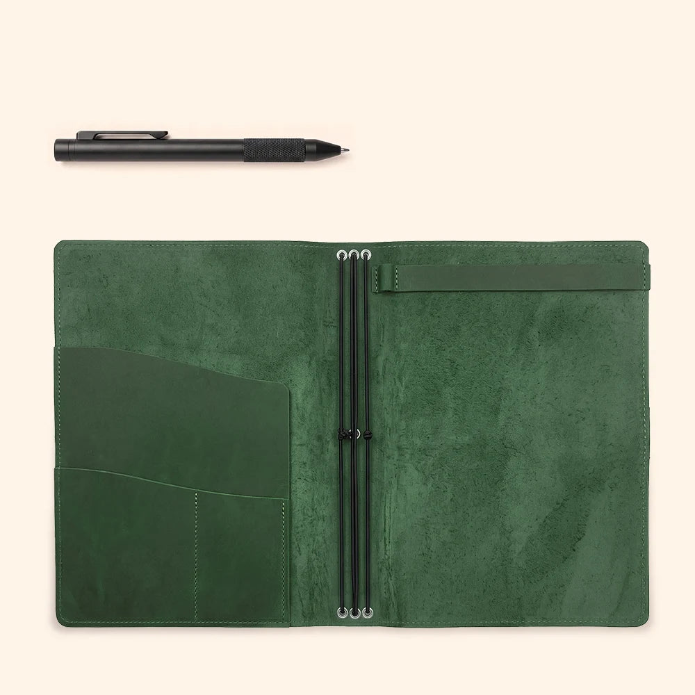Genuine leather notebook keeper featuring an expandable interior and secure insert holders.