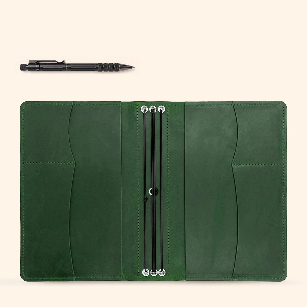 Leather notebook sleeve handcrafted for secure storage of notebooks and accessories.