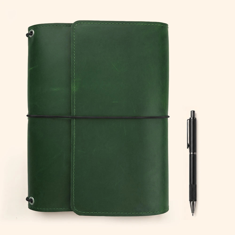 Leather writing notebook cover featuring structured organization and integrated leather pen loop inside.