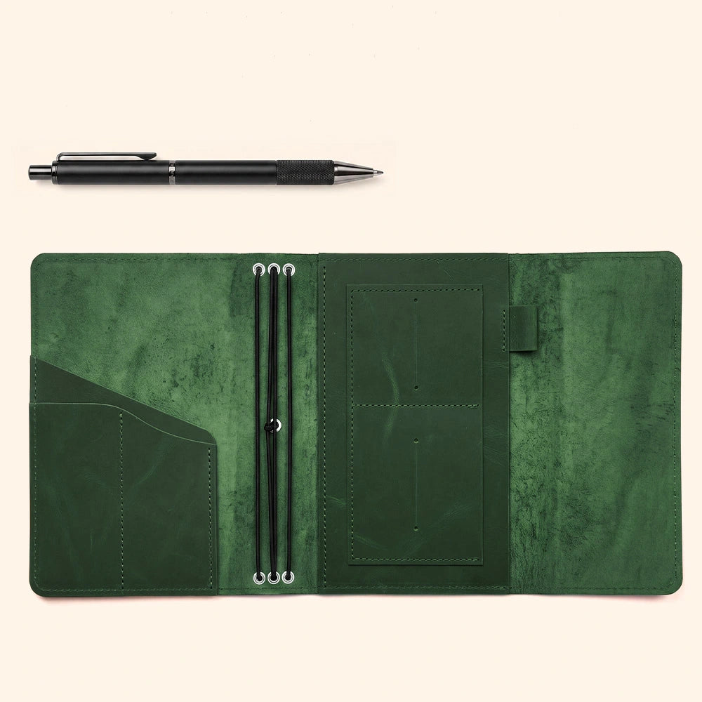Premium leather journal cover with functional card pockets and secure elastic pen loop.