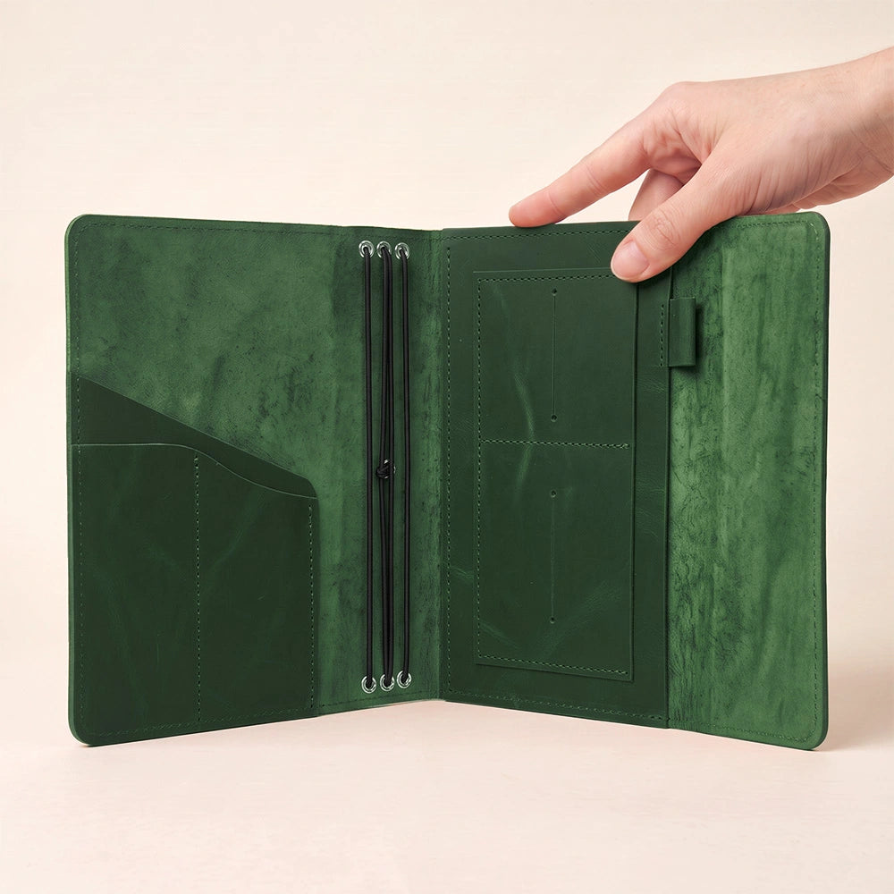 Leather journal organizer with functional pockets and integrated pen holder for everyday notes.