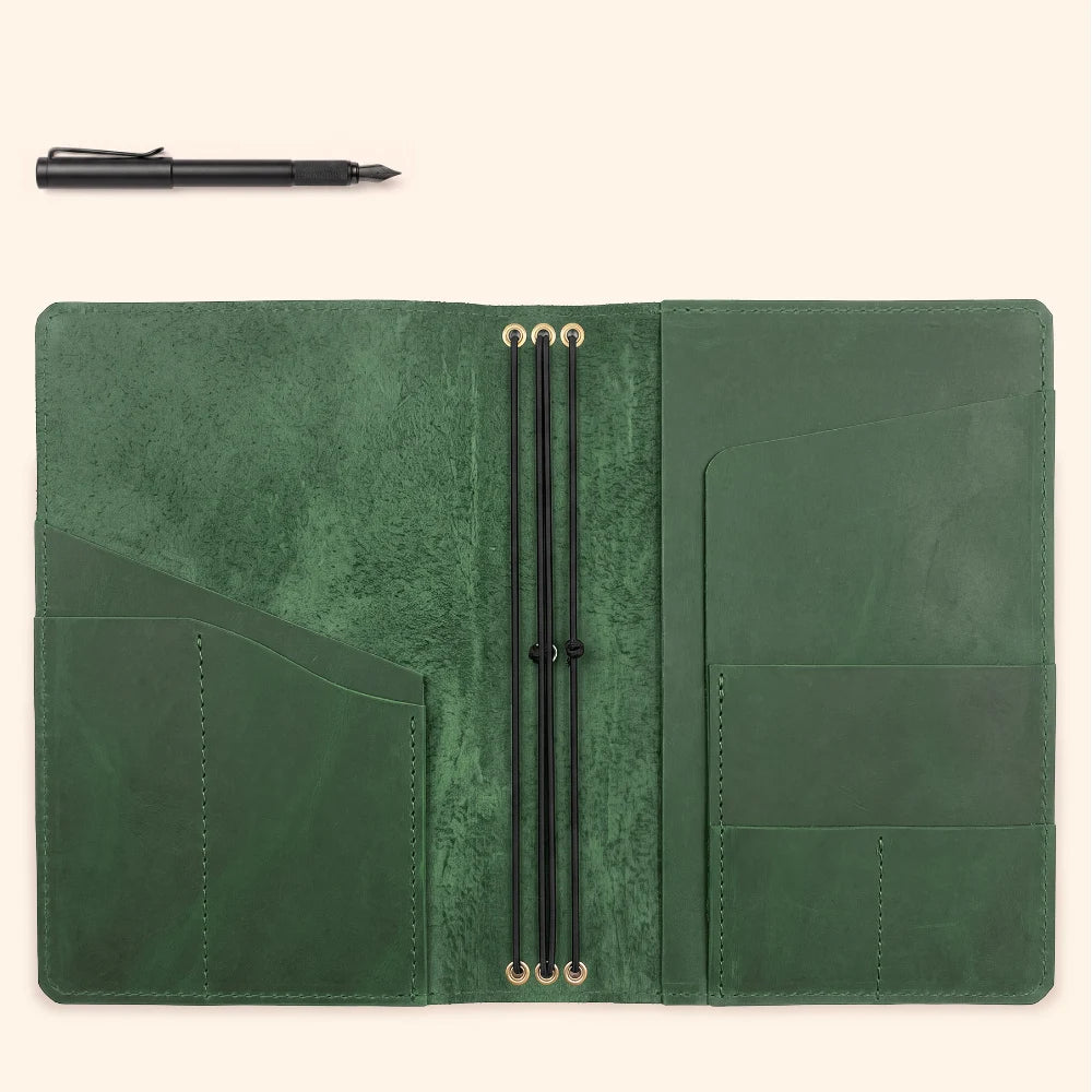 Natural leather cover providing flexible storage for three separate journal inserts.