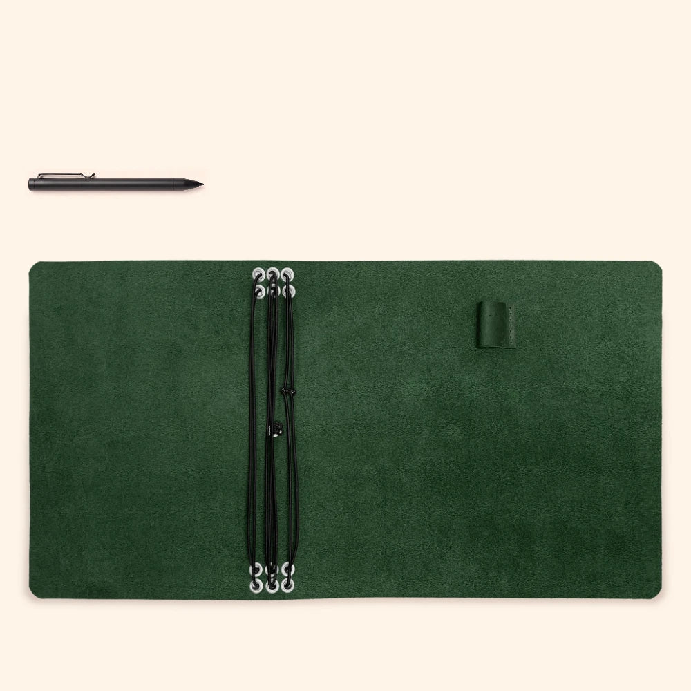 Premium leather notebook binder with six stretch retainers and easy pen storage.