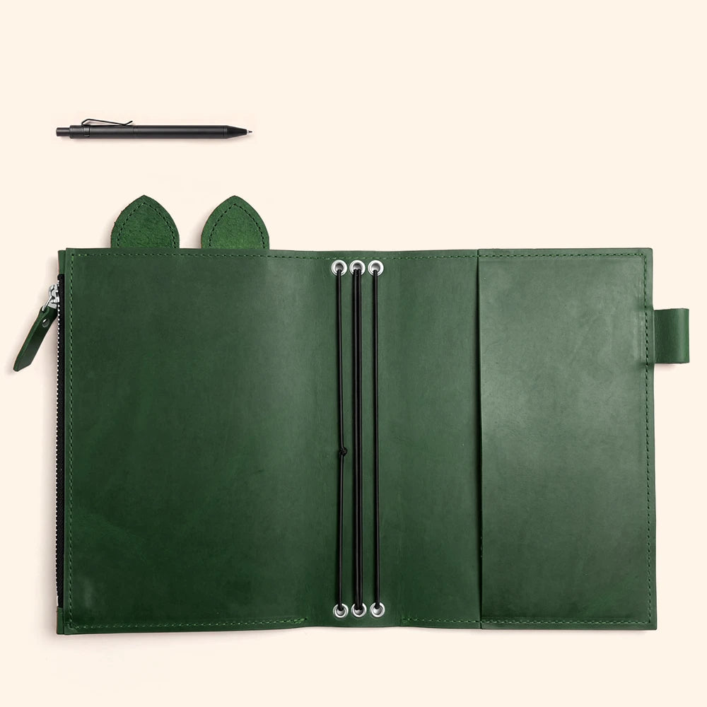Leather notebook cover featuring practical storage and a distinctive handcrafted appearance.