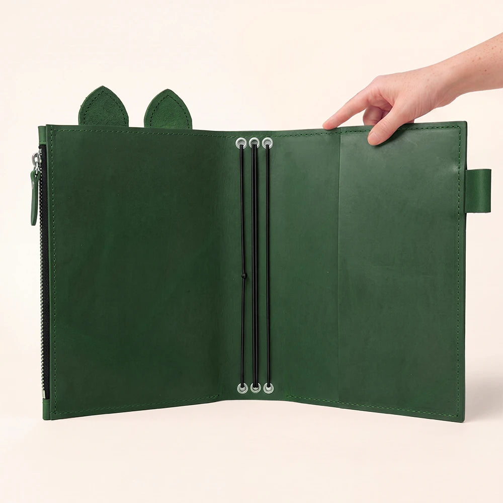 Handmade genuine leather writing case featuring smooth panels and secure zippered storage.