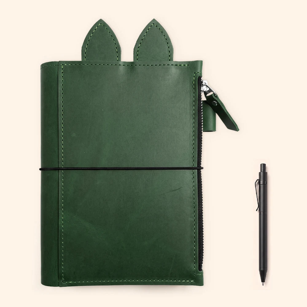 Refillable leather journal holder designed for multiple inserts and everyday writing supplies.