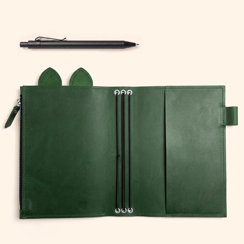 Genuine leather notebook holder featuring triple elastic cords and reinforced metal eyelets.