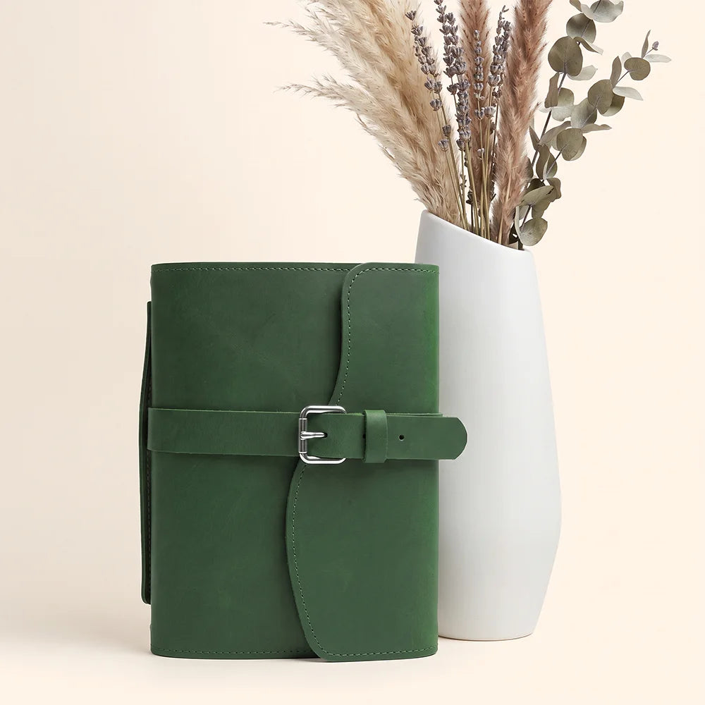 Genuine leather writing organizer showcasing practical sections, pen loop, ribbon marker, and convenient external handle.
