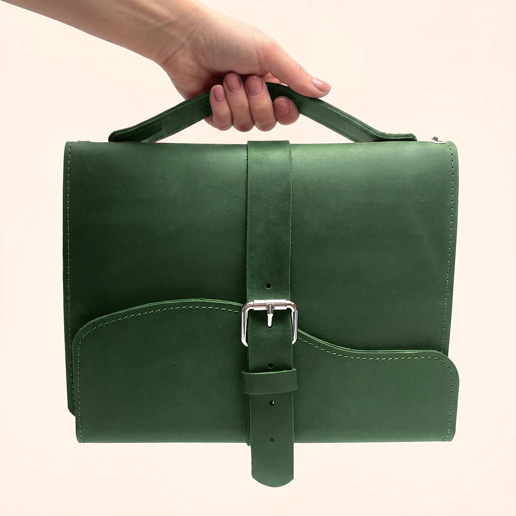 Premium refillable journal cover crafted from natural leather with three elastic straps.