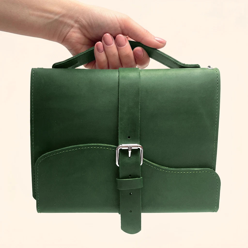 Premium natural leather notebook cover designed with three inner elastic bands and handle.