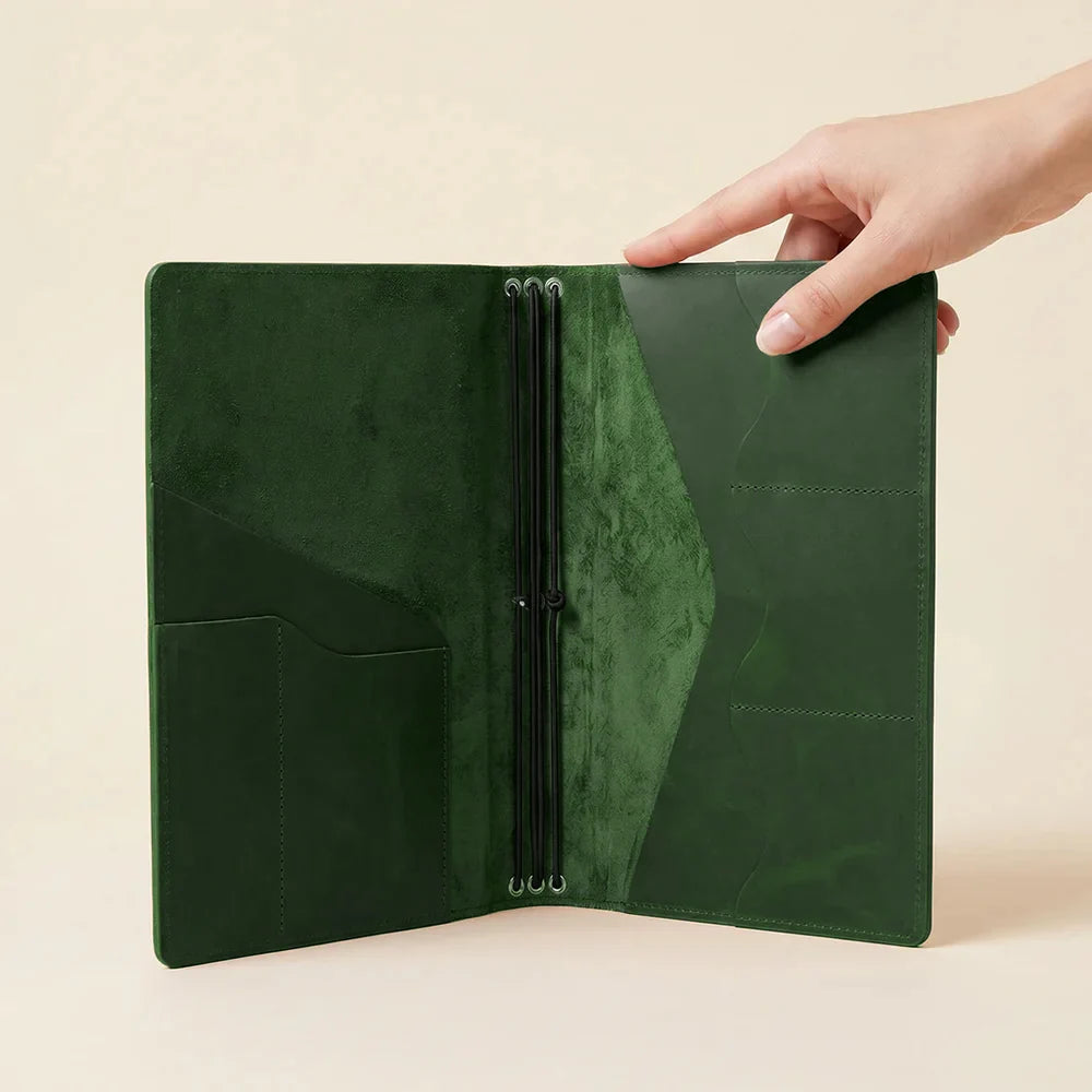 Leather writing notebook organizer with three elastic retainers and inner card slots.